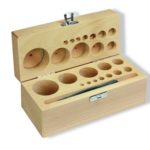 Coffret vide en bois pour rangement des poids cylindriques de précision